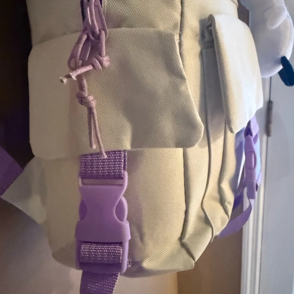 Cream Backpack with Purple Accents and Plush Keychain